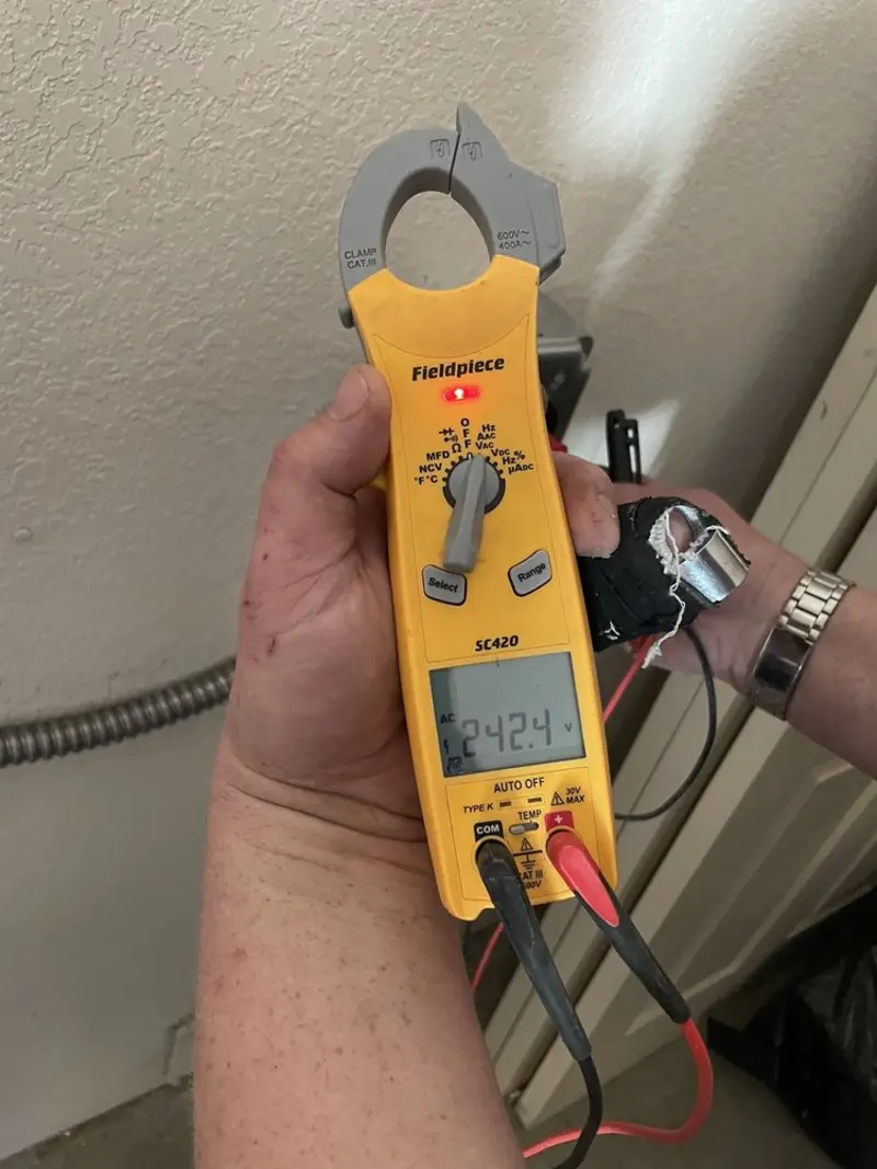 Voltage testing with clamp meter during Electrical Installation Services in Tulpehocken